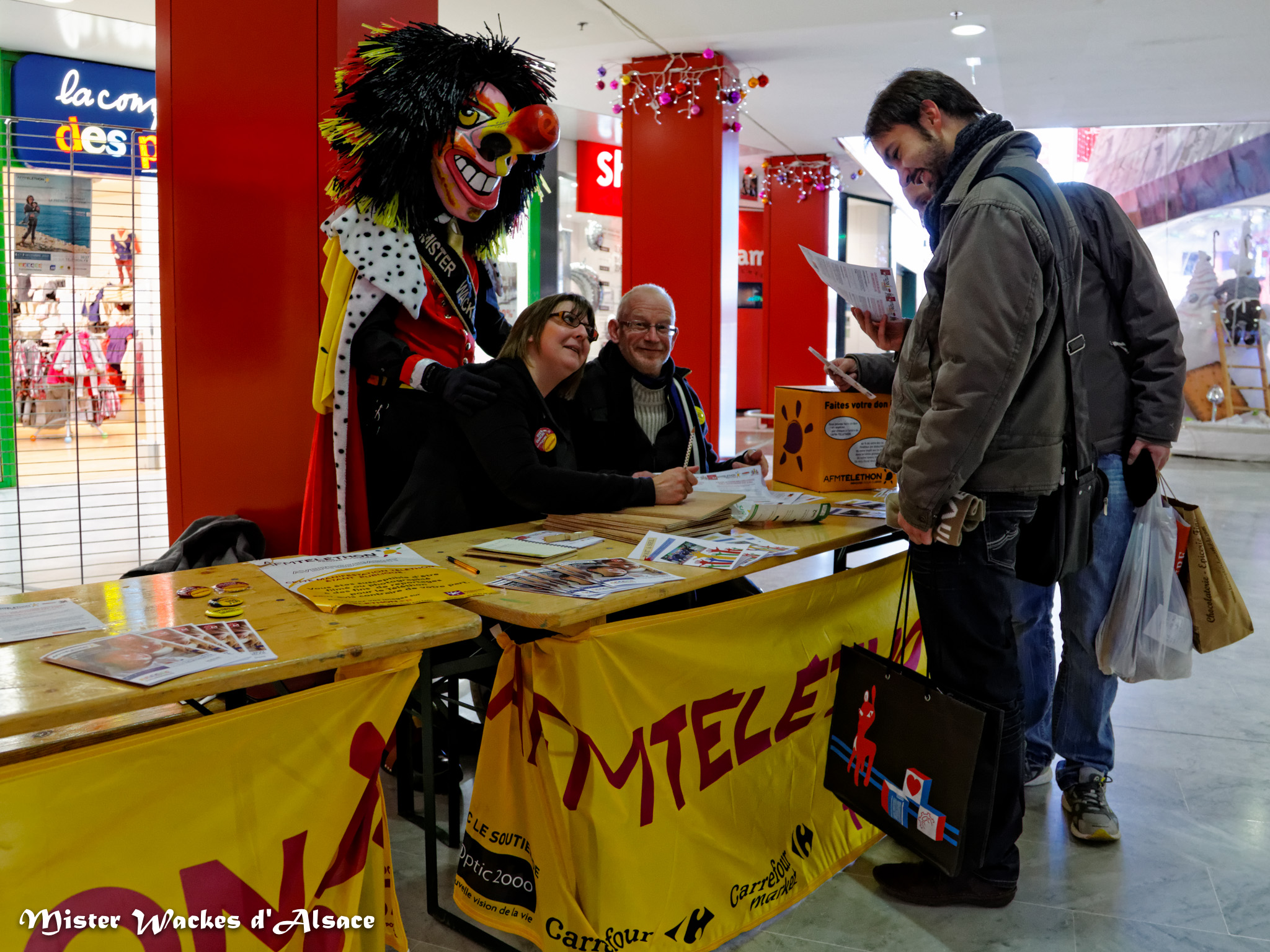 Téléthon Mulhouse 2013,Centre Commercial Porte Jeune, Chasse aux enigmes dans le centre ville de Mulhouse, organisée par l’association Pat’à Sel