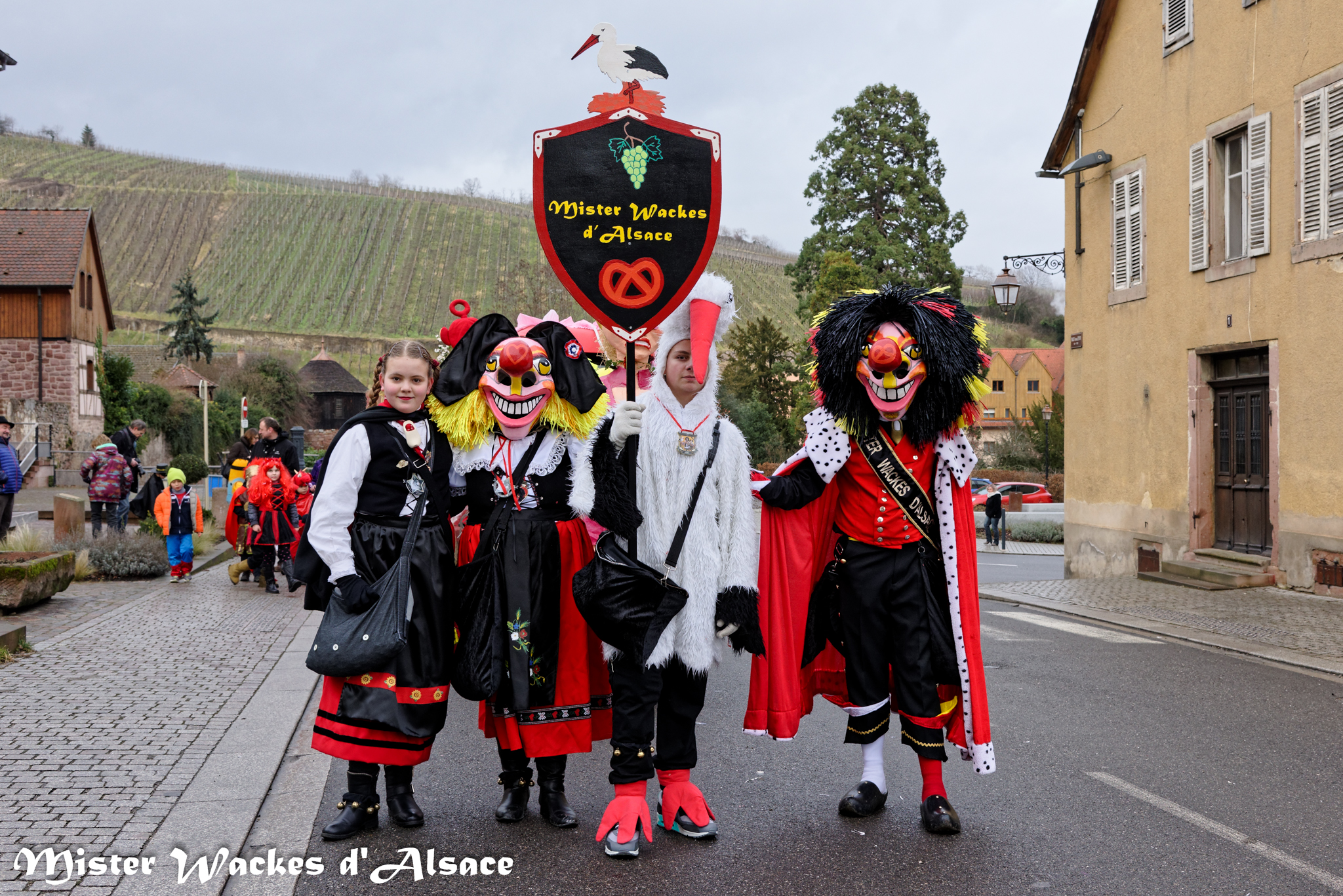 Carnaval de Riquewihr 2015 avec Mister Wackes d'Alsace, sa dulcinée Elsa, la petite Liesala et la cigogne Bretzel